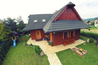 Exteriér ubytovania pri rieke a aquaparku v obci Bešeňová, River Cottage Bešeňová, Bešeňová