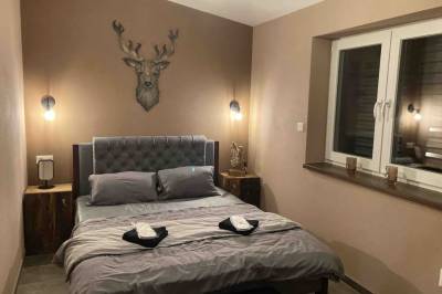 Spálňa s manželskou posteľou, Apartmány Bučina, Oravská Lesná