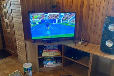 Obývačka s gaučom a TV, Chata Čremošné 105, Čremošné