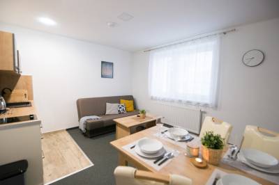 Apartmán so sedením a jedálenským stolom, Villa Michaela, Bešeňová